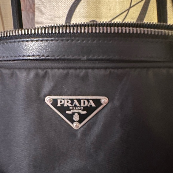 Prada black nylon tote. Great on outside. Needs repair on insider. See all pics - Picture 2 of 11
